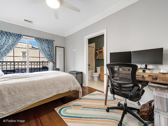 bedroom with visible vents, ornamental molding, wood finished floors, connected bathroom, and ceiling fan