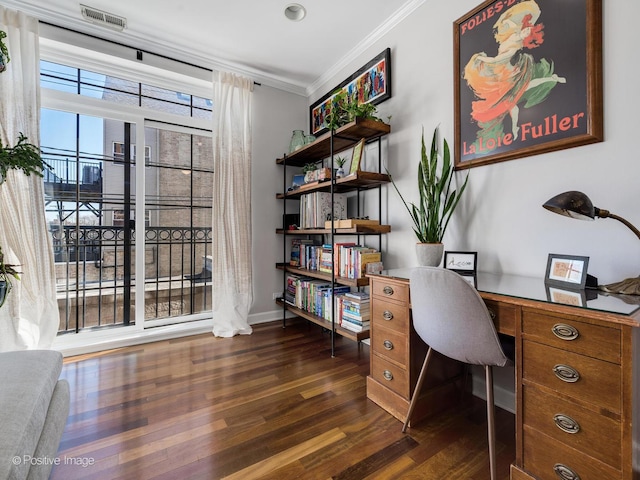 home office with dark wood finished floors, visible vents, crown molding, and baseboards