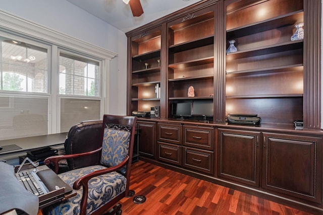 office area featuring dark wood-style flooring and ceiling fan