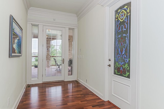 entrance foyer with crown molding, baseboards, and wood finished floors