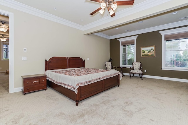 bedroom featuring crown molding, light colored carpet, baseboards, and ceiling fan