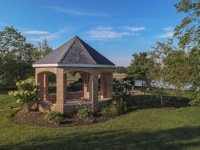 view of community with a gazebo and a lawn