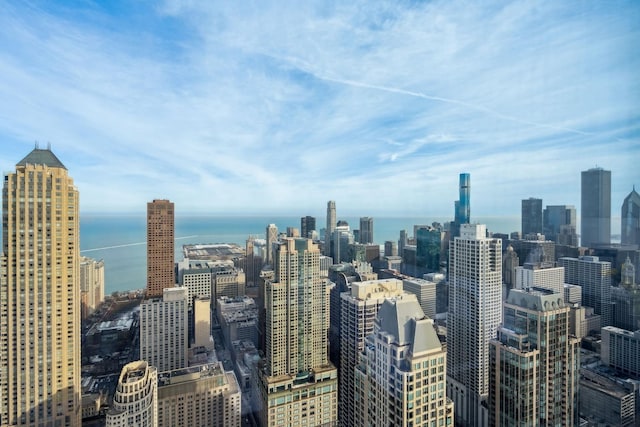 property's view of city featuring a water view