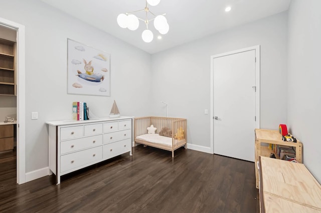 living area with recessed lighting, baseboards, a chandelier, and dark wood-style flooring