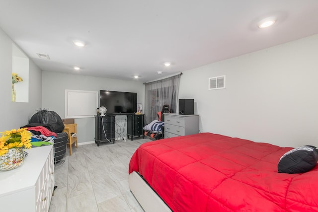 bedroom with recessed lighting and visible vents