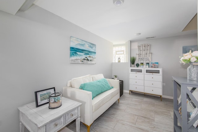 bedroom featuring visible vents and baseboards