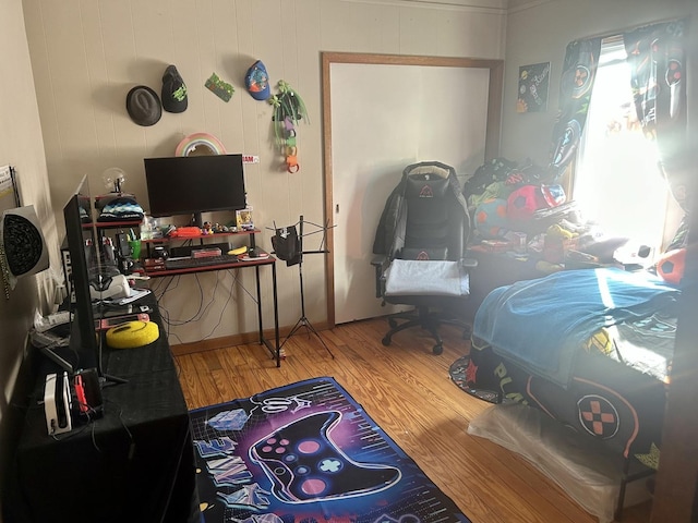 bedroom featuring wood finished floors