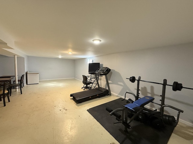 exercise room with baseboards