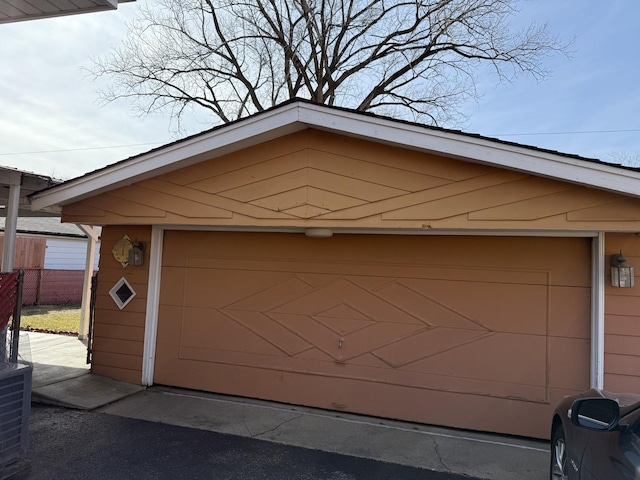 garage featuring fence