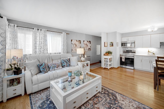 living room featuring light wood-style floors