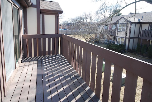 wooden terrace featuring a residential view