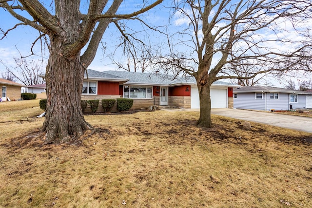 single story home featuring an attached garage, stone siding, and driveway