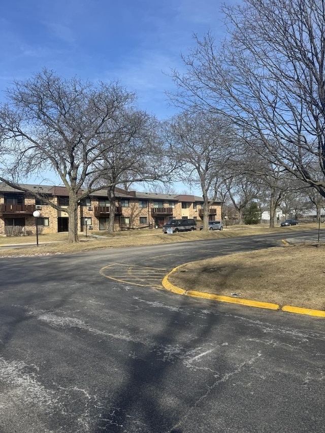 view of street with curbs