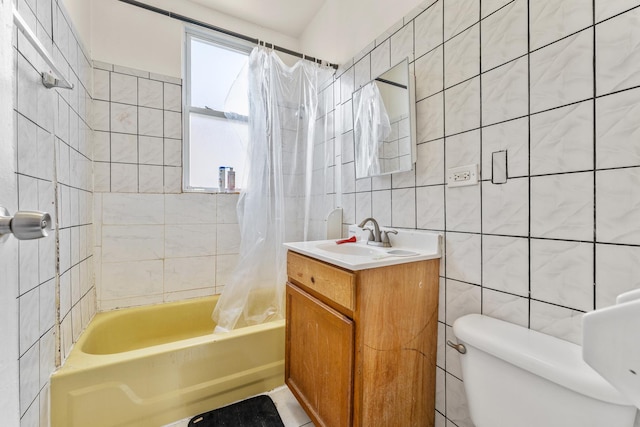 bathroom featuring vanity, decorative backsplash, shower / bath combination with curtain, tile walls, and toilet