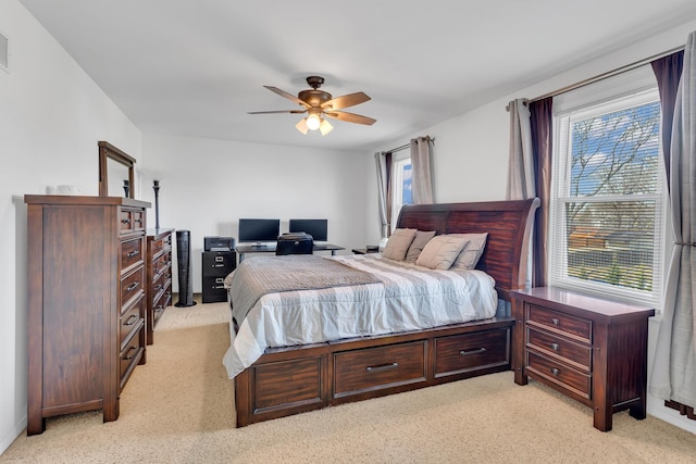 bedroom featuring visible vents and a ceiling fan