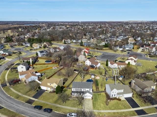 birds eye view of property with a residential view