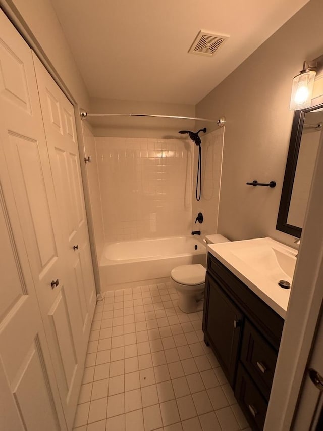 bathroom featuring visible vents, toilet, tile patterned floors, vanity, and  shower combination