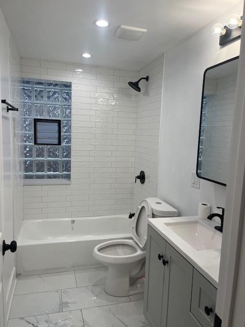 bathroom with vanity, recessed lighting, bathtub / shower combination, toilet, and marble finish floor