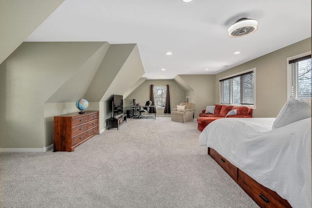 carpeted bedroom with recessed lighting, multiple windows, baseboards, and lofted ceiling