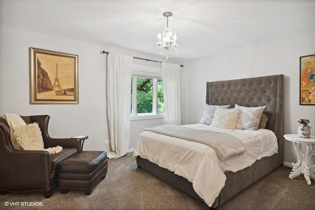 carpeted bedroom featuring baseboards and a notable chandelier