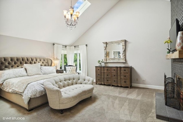 carpeted bedroom with a notable chandelier, baseboards, high vaulted ceiling, and a fireplace