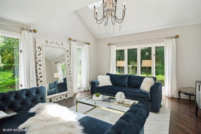 living room featuring an inviting chandelier, wood finished floors, and vaulted ceiling