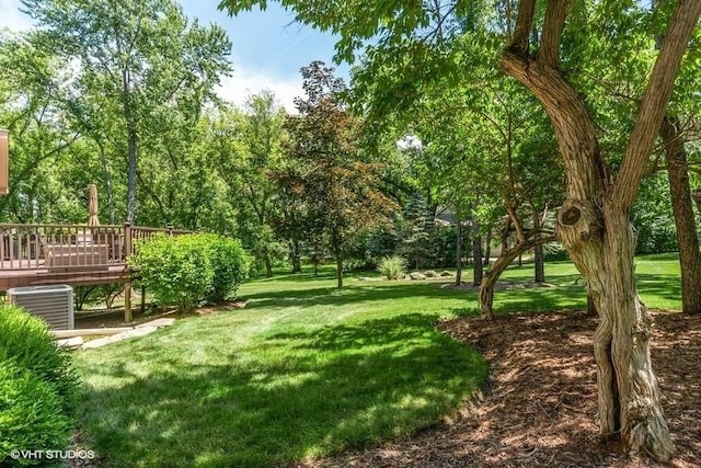 view of yard with central AC