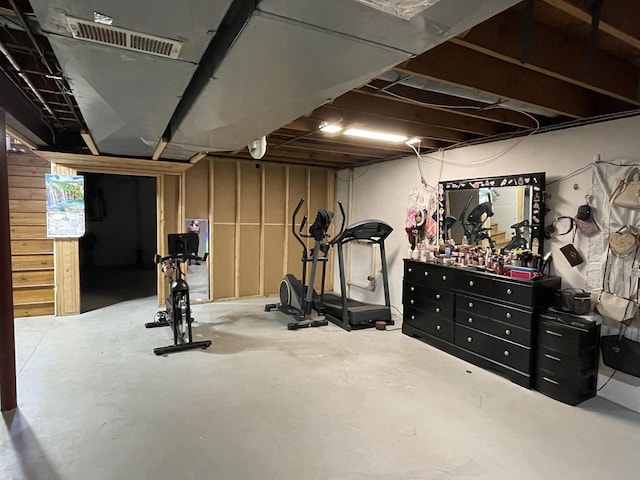 exercise room featuring visible vents