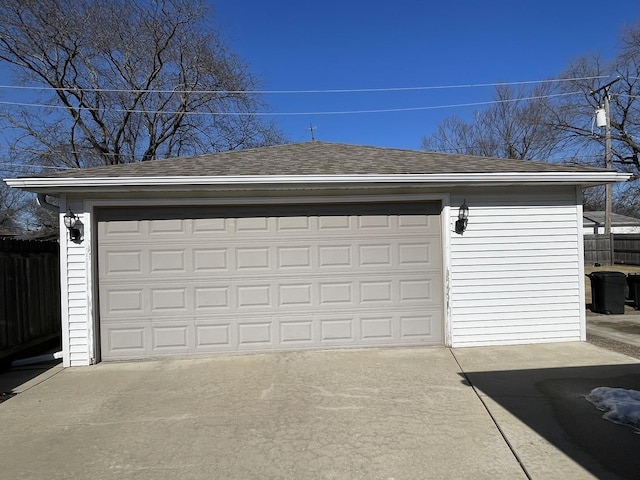 detached garage with fence