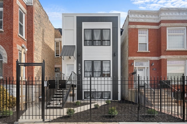 6530 S Champlain Ave, Chicago, IL 60637 - townhome / multi-family property with metal roof and fence
