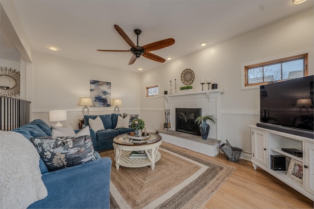 421 Dodson St, Geneva, IL 60134 - living room with light wood-type flooring, a ceiling fan, a fireplace, and recessed lighting