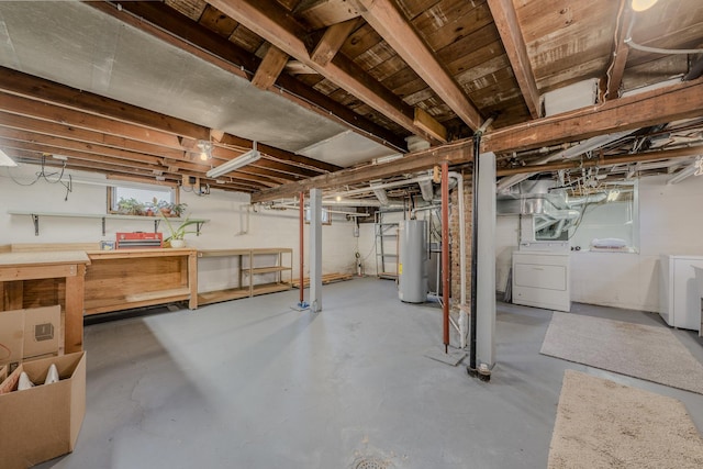 421 Dodson St, Geneva, IL 60134 - below grade area featuring separate washer and dryer, water heater, and a workshop area