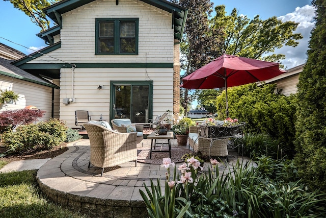 421 Dodson St, Geneva, IL 60134 - rear view of house with a patio and outdoor lounge area