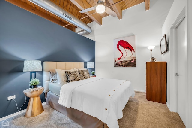 bedroom with beamed ceiling, carpet flooring, wood ceiling, and visible vents