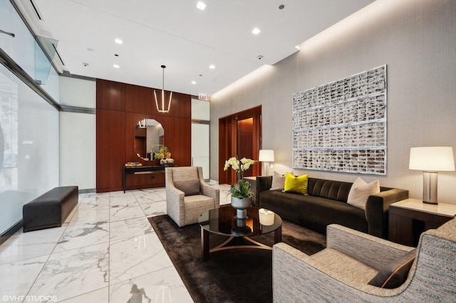 77 E Walton Pl Unit 24E, Chicago, IL 60611 - building lobby featuring recessed lighting and a high ceiling