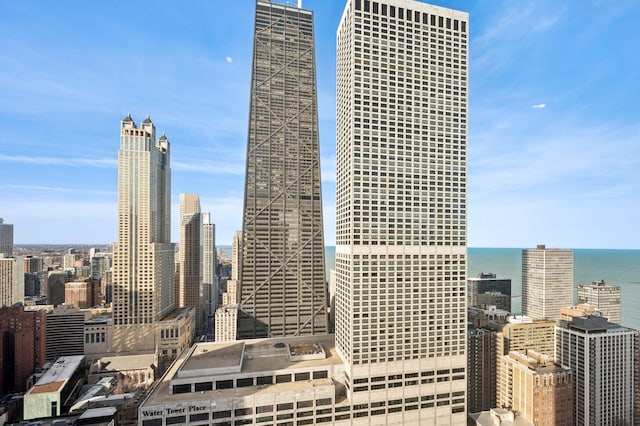 property's view of city with a water view