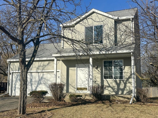 view of front facade featuring aphalt driveway, fence, and roof with shingles