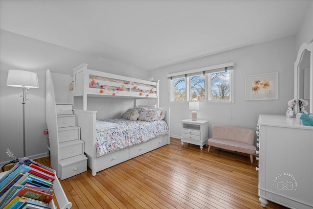 bedroom featuring light wood-style flooring