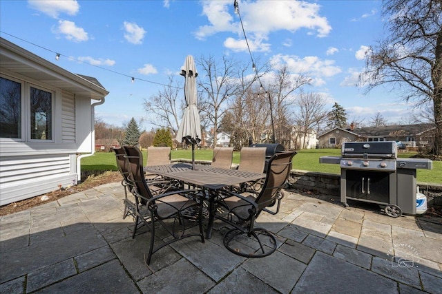 view of patio / terrace featuring outdoor dining space and area for grilling