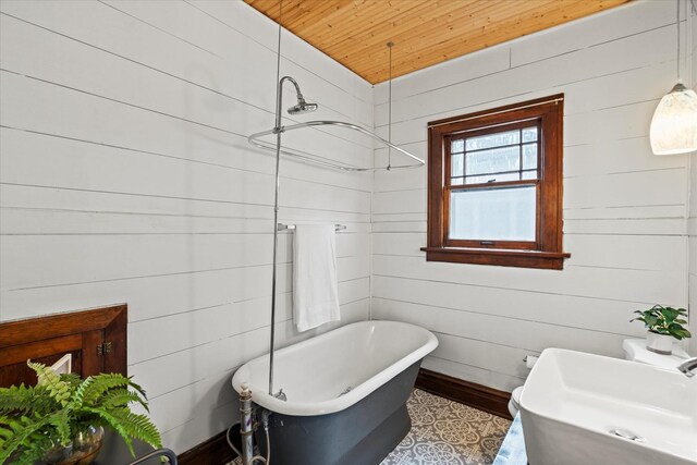 896 S Myrtle Ave, Kankakee, IL 60901 - full bath with wood ceiling, a soaking tub, a sink, and wood finished floors