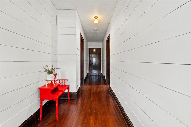 896 S Myrtle Ave, Kankakee, IL 60901 - hall featuring dark wood finished floors and wood walls