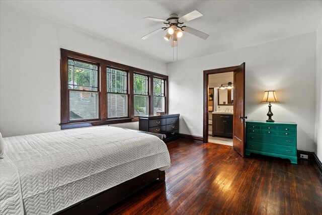 896 S Myrtle Ave, Kankakee, IL 60901 - bedroom featuring hardwood / wood-style floors, baseboards, connected bathroom, and a ceiling fan