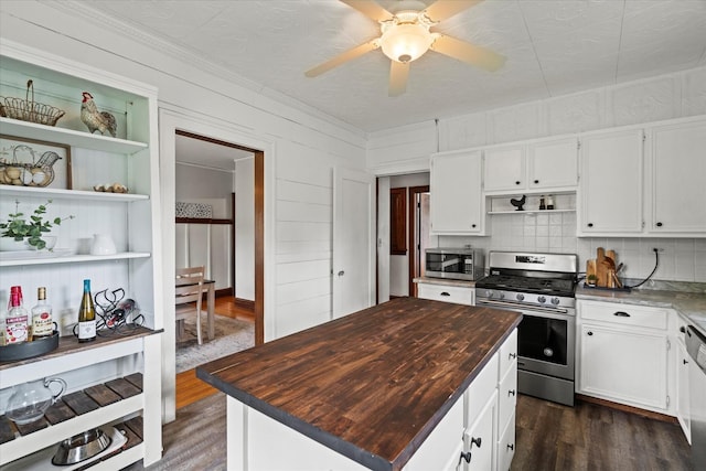 896 S Myrtle Ave, Kankakee, IL 60901 - kitchen featuring stainless steel appliances, open shelves, dark wood finished floors, butcher block countertops, and ornamental molding