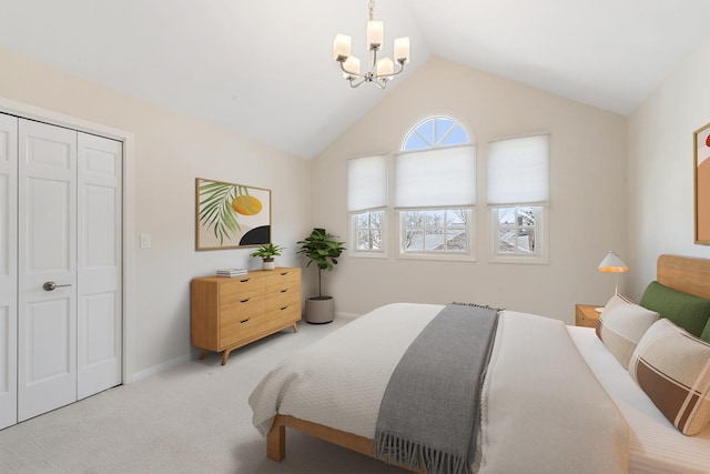 bedroom featuring vaulted ceiling, baseboards, a chandelier, and light carpet