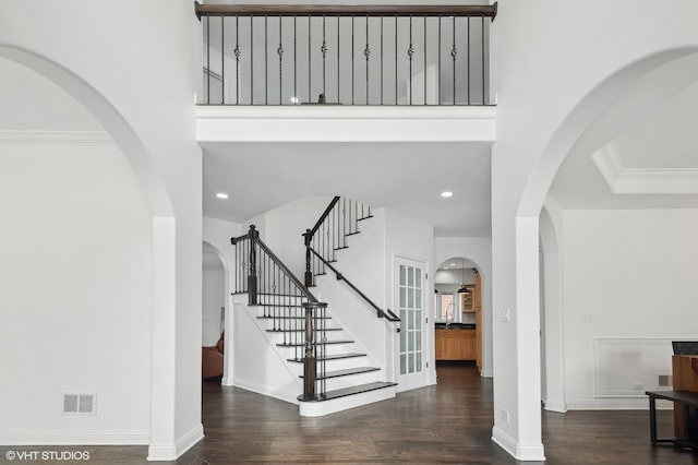 entryway with visible vents, recessed lighting, baseboards, and wood finished floors