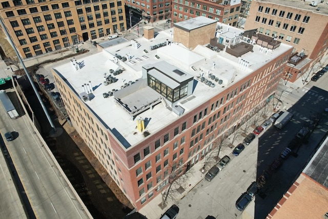 birds eye view of property featuring a view of city