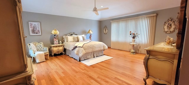 bedroom featuring a ceiling fan and light wood finished floors