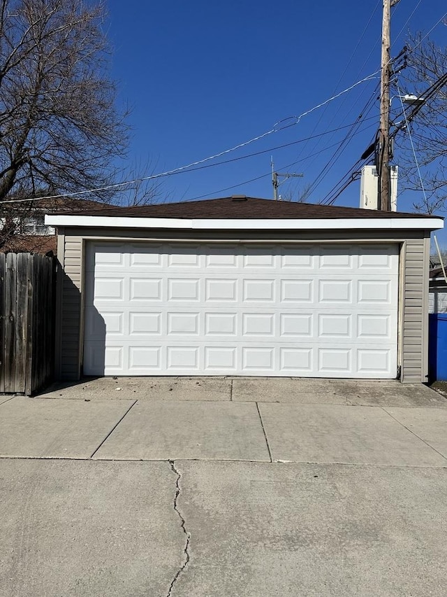 garage featuring fence