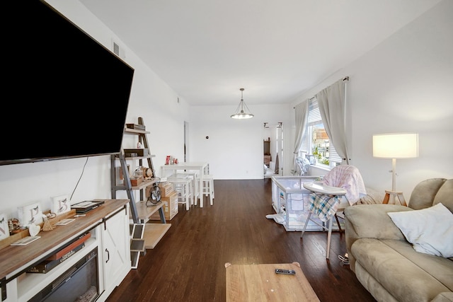 living room with dark wood finished floors