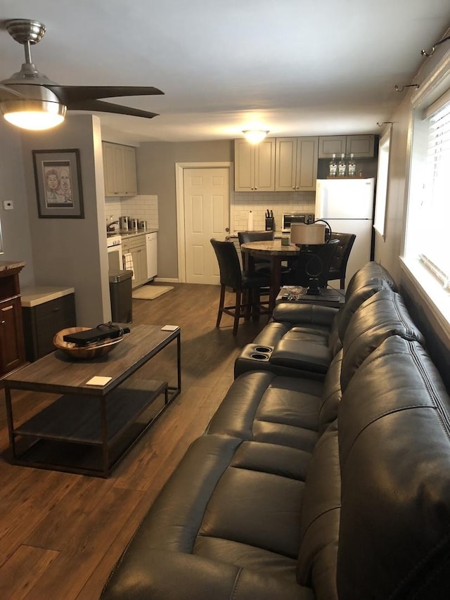 living area with dark wood-type flooring